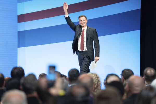 Britain s Treasury chief raises the minimum wage but angers some